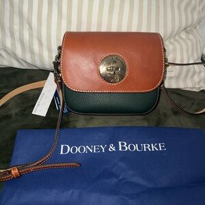 Dooney & Bourke
Pebble Turnlock Flap Saddle Crossbody Bag